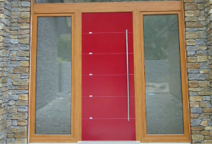 red modern entrance door with glass panes on each side