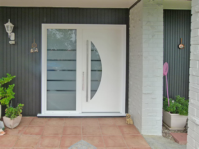stylish white entrance door with glass pane on one side